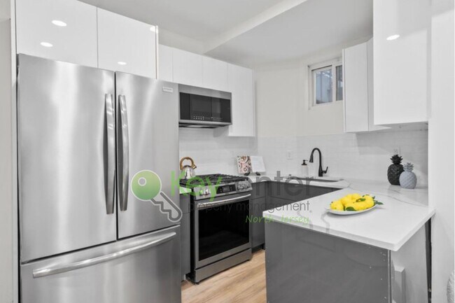 Photo - Rare Renovated 3BR/2BA Townhouse with Private Yard & NYC Views