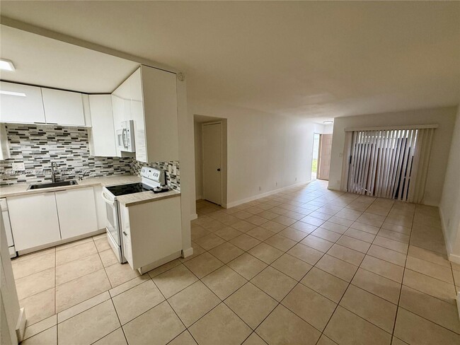Photo - 702 Gardens Dr Unit 105