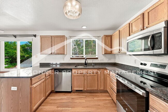 Photo - Spacious Home with Central AC and 2-Car Garage