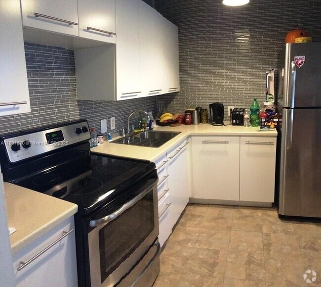 Building Photo - 3475 N Country Club Dr Unit 507 Rental