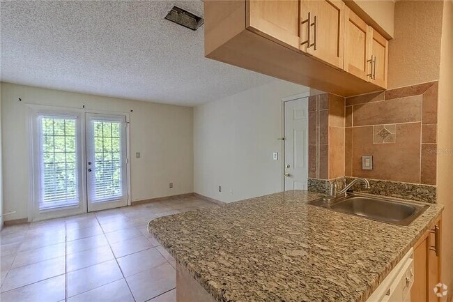 Building Photo - 2550 N Alafaya Trail Unit 10203 Rental