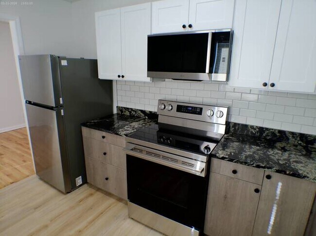 Photo - Spacious 4 bedrooms and 3 baths with vanity off 90th & Wornall Road in sought out WALDO AREA near...