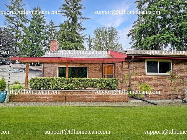 Photo - "Spacious 4-Bed Kenmore Retreat with Gleaming Hardwood Floors & Fully Finished Basement!"