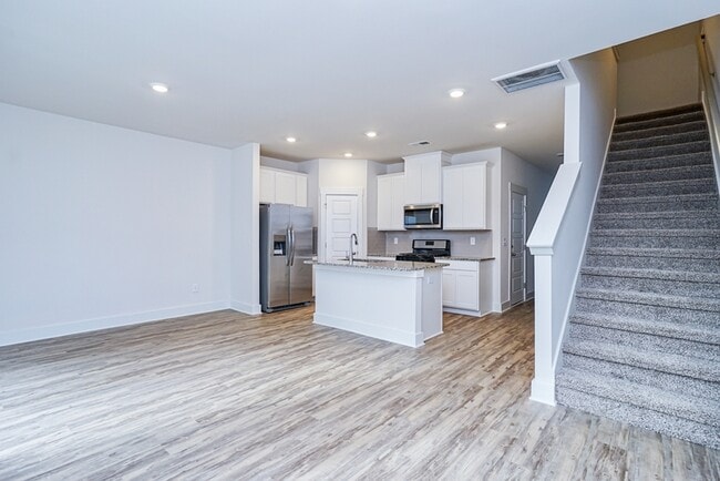 Photo - 303 Windsinger Ln