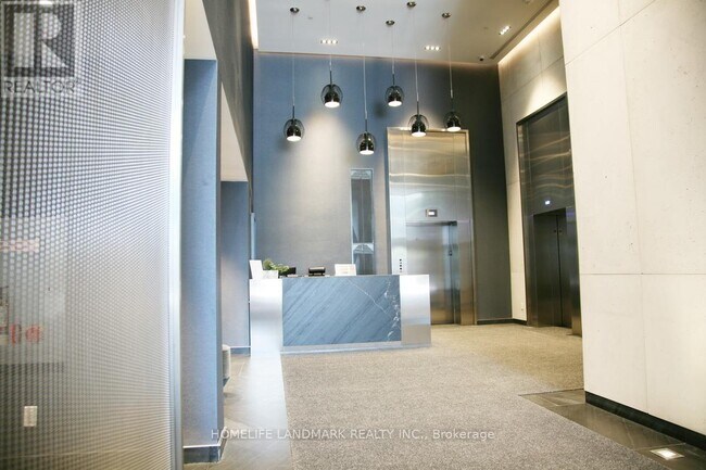 Photo - 28 Wellesley St E Unité 306