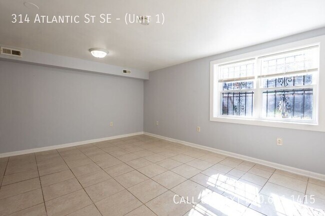 Photo - 314 Atlantic St SE Unidad ( 1)