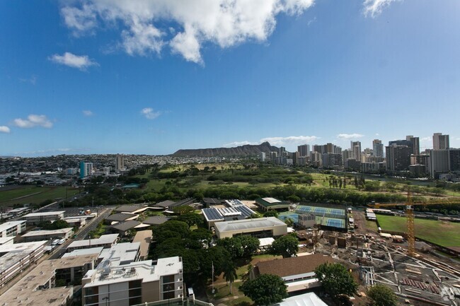 Building Photo - Royal Iolani Corner Unit 2BD 2 BA w/ 2 Par... Rental