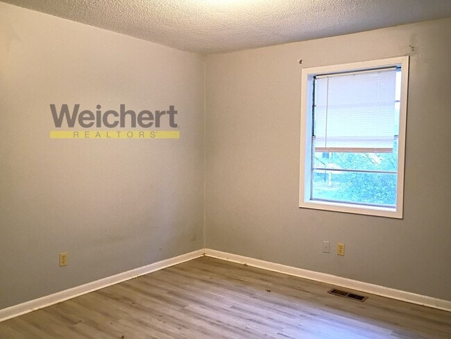 Photo - Convenient 3BR/1.5BA Duplex Near Schools and Shopping