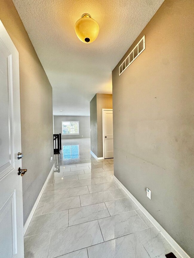Photo - For Rent Beautiful 4 bedroom 3 bathroom 3 attached car garage!