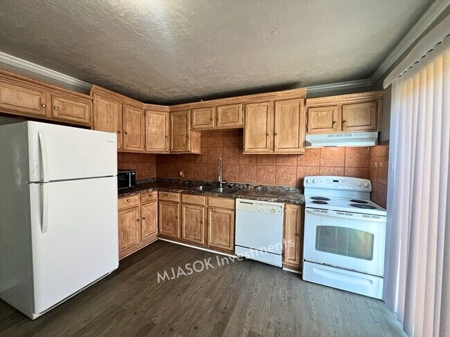 Photo - 4 Bedroom Home in Lawton — Available Now