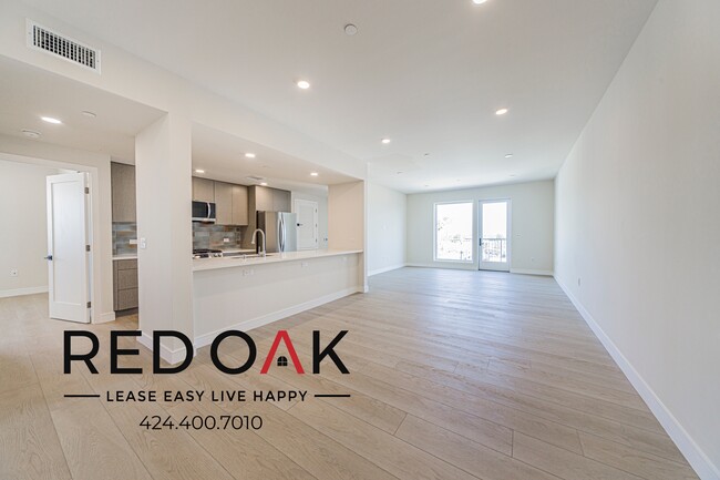 Building Photo - 5320 Cartwright Ave Unit 504