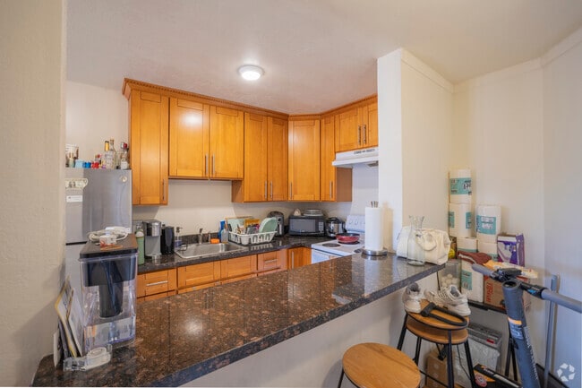 4BR, 1BA - 1000 SF - Kitchen - Channing Campus Apartments