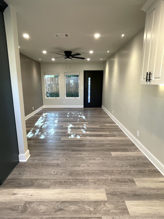 Living Room (dual pane windows, lots of natural light, recessed dimmable lighting) - 3211 W Alameda Ave Apartments Unit B