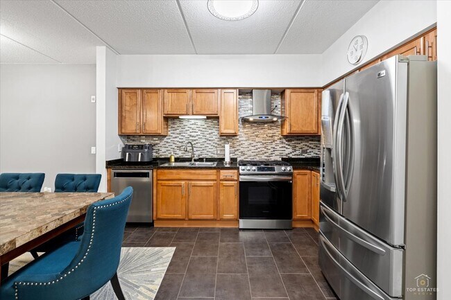 Photo - 3501 Wellington Ct Unit 203