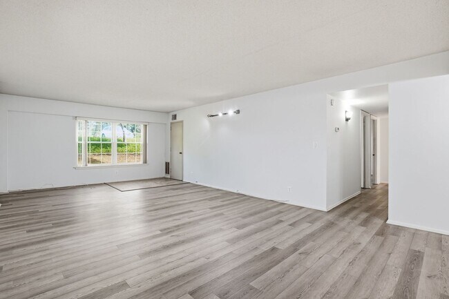 Photo - This expansive ground level residence is set within a serene, gated garden community surrounded b...