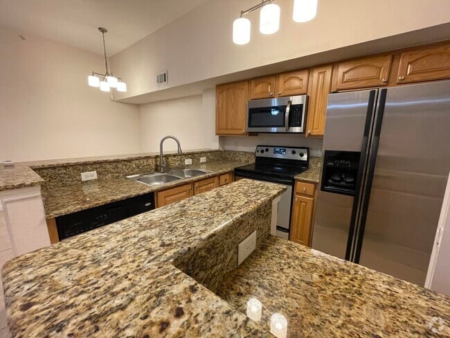 Building Photo - 211 SW Palm Dr Unit 306 Rental