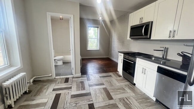 Building Photo - 1129 Rogers Ave Unit 3