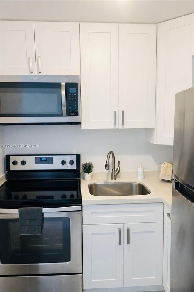 Building Photo - 7904 West Dr Unit 109