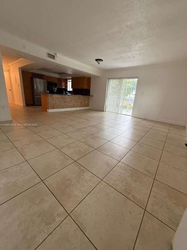Building Photo - 2660 W 76th St Unit 209