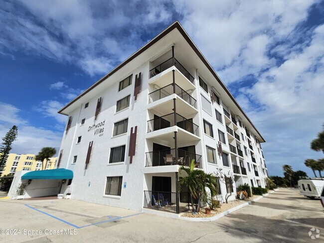 Building Photo - Coastal Paradise Awaits: Elegant 2-Bed, 2-... Unit #403 Rental