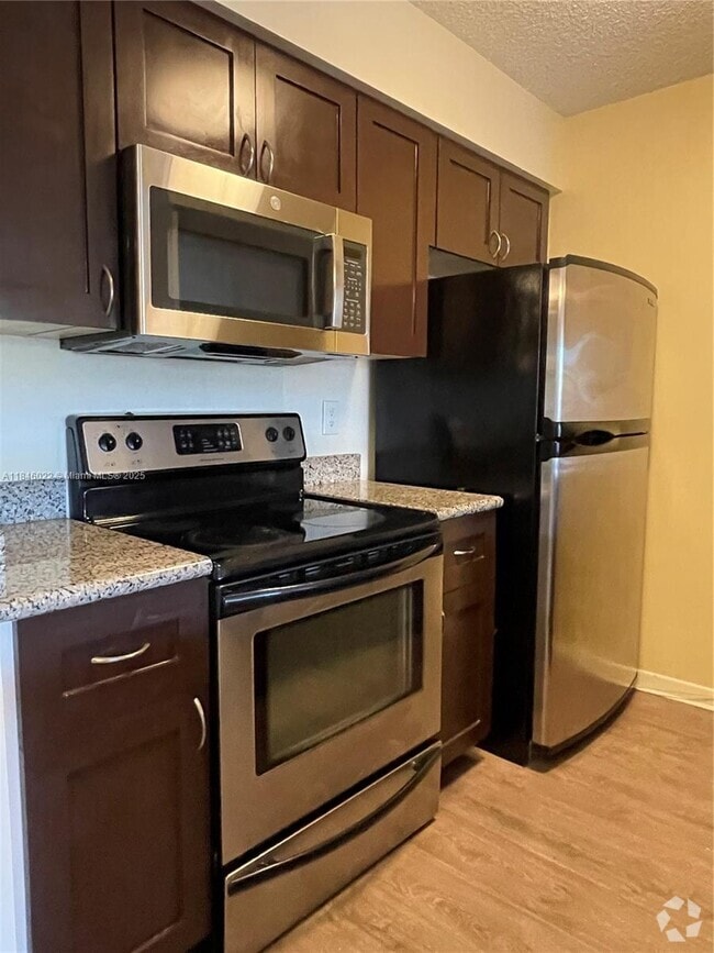 Building Photo - 10428 NW 8th St Unit 204 Rental