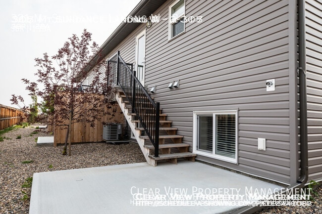 Photo - ? Effortlessly stylish contemporary 3 bedroom, 1.5 bathroom townhouse! ??Showings available at (4... Unit 2