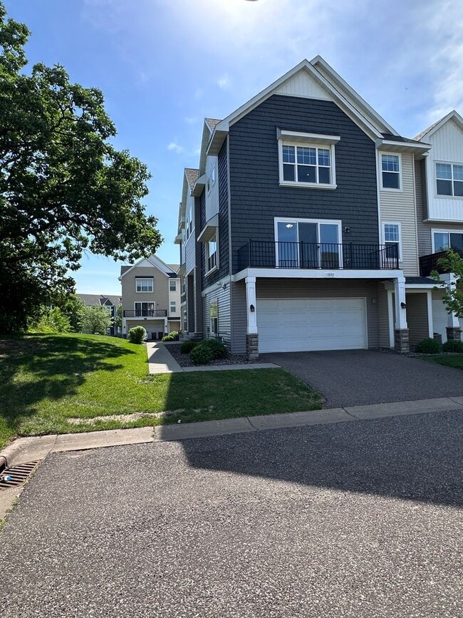 Building Photo - Champlin Corner Unit Town Home, 2 Car Garage, Dishwasher, Washer/Dryer, Balcony