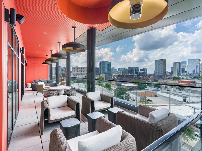 Sky lounge with plush seating and sweeping views of downtown Nashville—just one of many ways Modera SoBro elevates your everyday.