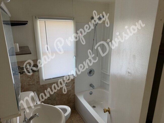 Photo - 4 Bed / 2 Bath Home – Large Yard, Basement, New Appliances!