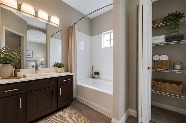Step into elegance with this beautifully designed bathroom at Red Rock Villas. Featuring modern fixtures and a serene ambiance, it offers the perfect blend of comfort and style. Explore your oasis today and envision your new home!