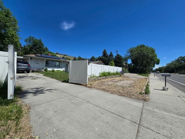 Photo - Spacious 4 Bedroom Home with Solar Panels, Fully Fenced Yard on Rimrock Rd