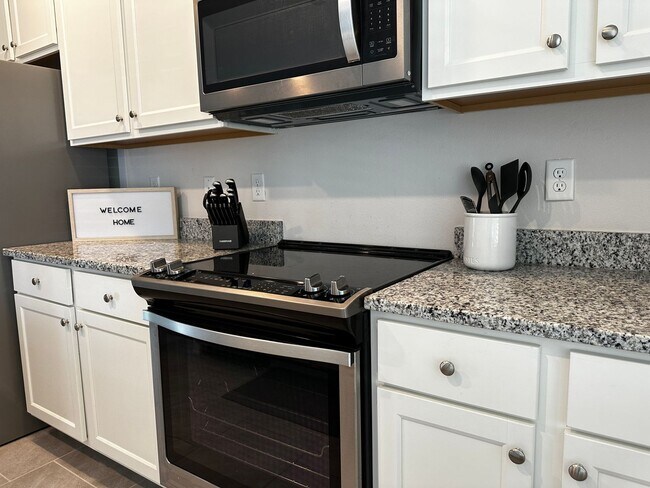 Photo - Resort Style Living! Stunning 3/2.5 Townhome in Waterleigh! Available April!