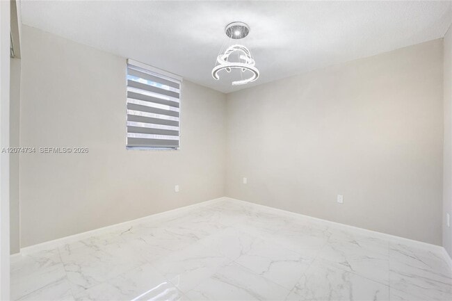 Building Photo - 10000 NW 80th Ct Unit 2102
