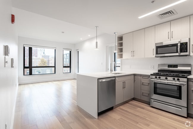 3HAB, 2BA - Sala de estar y cocina - Camden Street Apartments