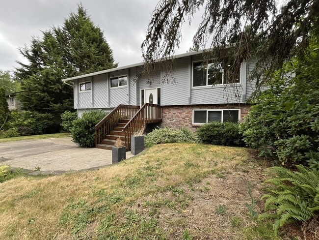 Photo - Three-Bedroom Home Near Nike Campus with Bonus Room, Large Deck & Two-Car Garage
