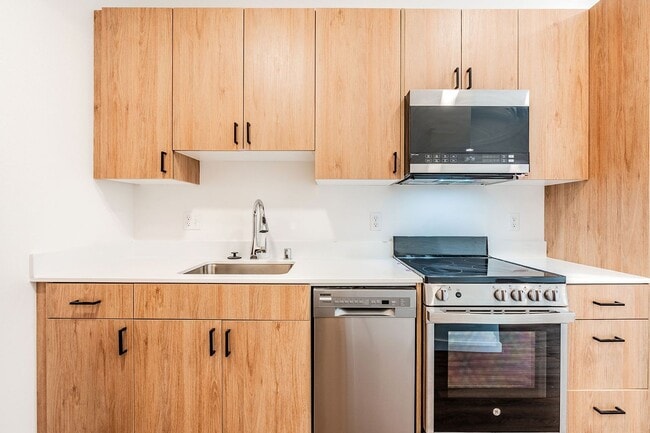 Photo - Atrium - Welcome to South Seattle’s Newest Modern Living Experience — Steps From the Light Rail