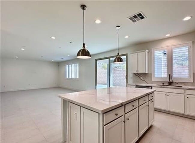 Photo - Stunning and Spacious 6BR 5BA Home w/ Solar Panels + Quartz Counter + Fenced Yard + 2 Car Garage ...
