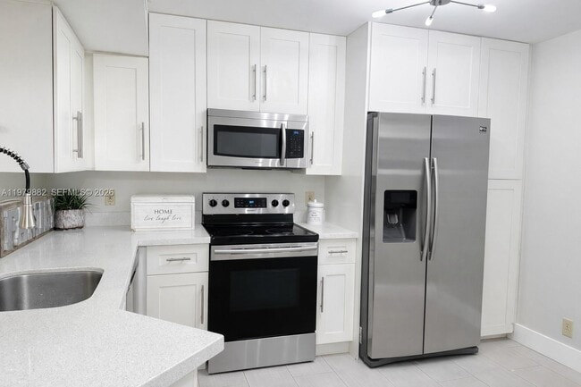 Photo - 8851 Wiles Rd Unit 106