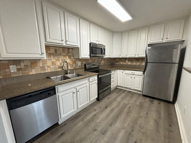 Photo - Upstairs Two Bedroom Condo with in-unit La... Unit #86