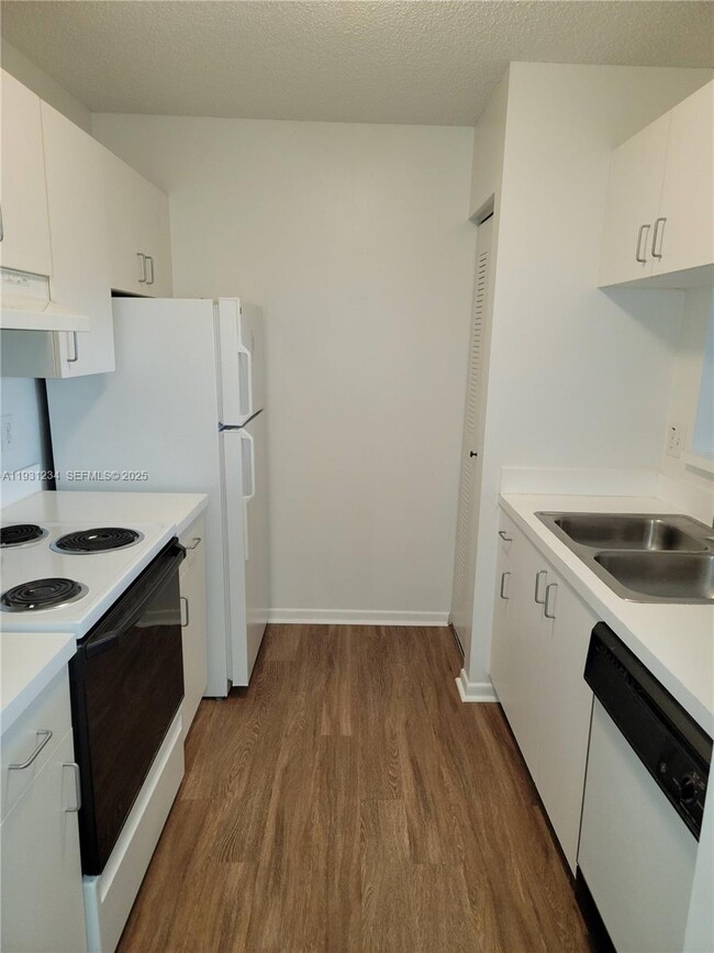 Photo - 1701 Village Blvd Unit 205