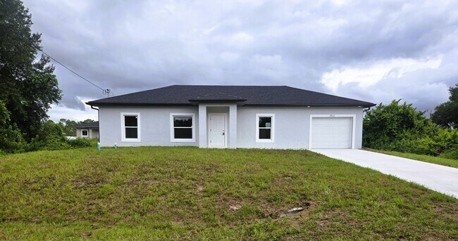 Building Photo - BRAND NEW 3/2/1 -SW LEHIGH ACRES FL Rental