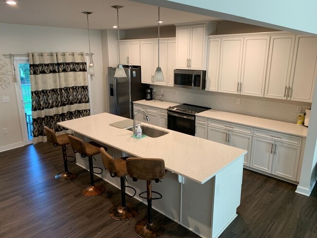 Photo - 4-bedroom, 3.5-bath townhouse in Dye Estates