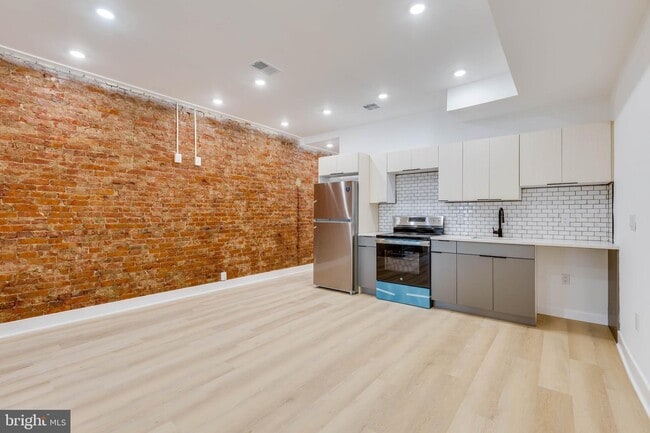 Photo - 6027 Delancey St Apartment Unit A
