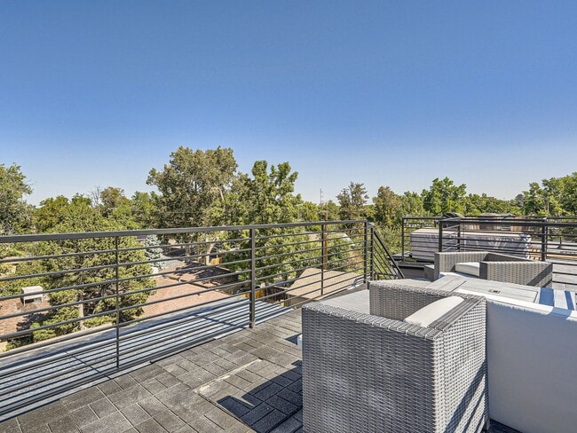 Photo - Evolve Real Estate: Gorgeous Rowhome with ROOFTOP DECK blocks from DU Available July 5!