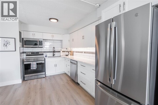 Photo - 155 Front St N Unité 210