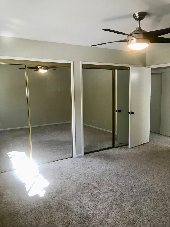 Double closet in the primary bedroom! - 565 Matadero Ave Unit 7