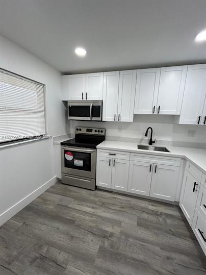 Building Photo - 8875 Fontainebleau Blvd Unit 201
