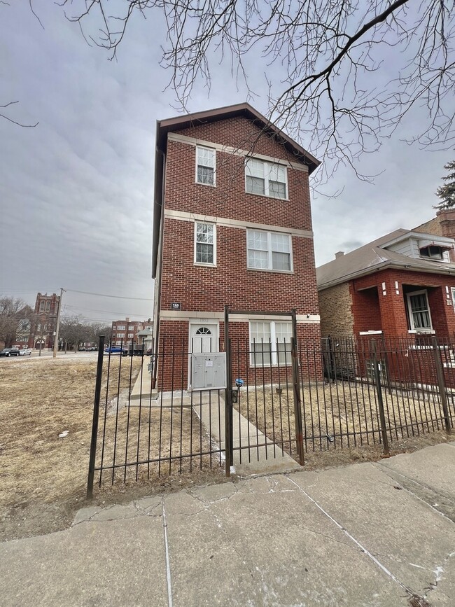 Building Photo - 7952 S Carpenter St Unit 3
