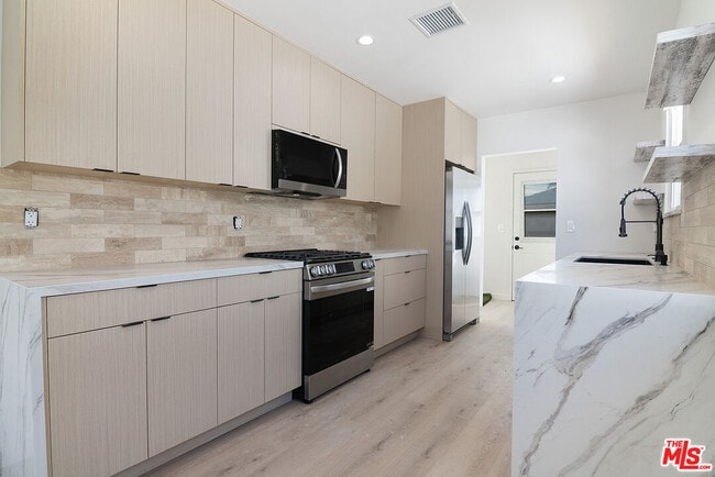 Building Photo - 17638 Welby Way
