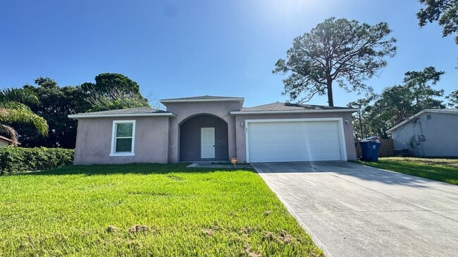 Building Photo - Amazing 4 Bedroom, 2 Bathroom Home in Palm Bay!!